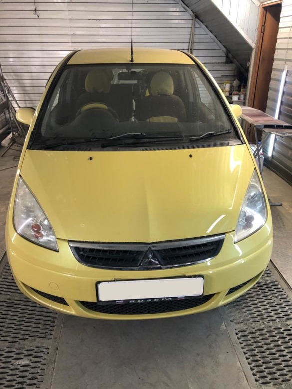Mitsubishi восстановление передней части кузова Фото Mitsubishi после замены и покраски деталей